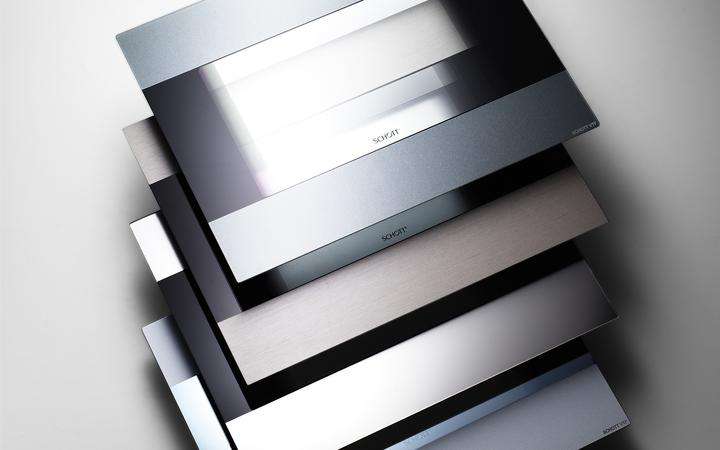 A range of SCHOTT outer oven glass doors in different colors