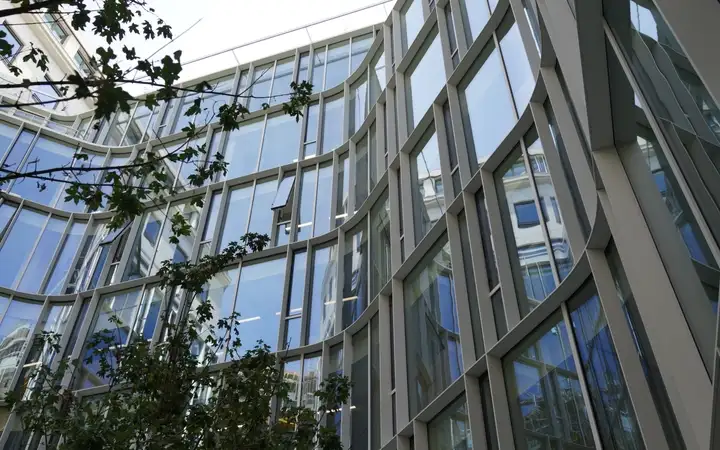 Exterior of an office building with glass facade