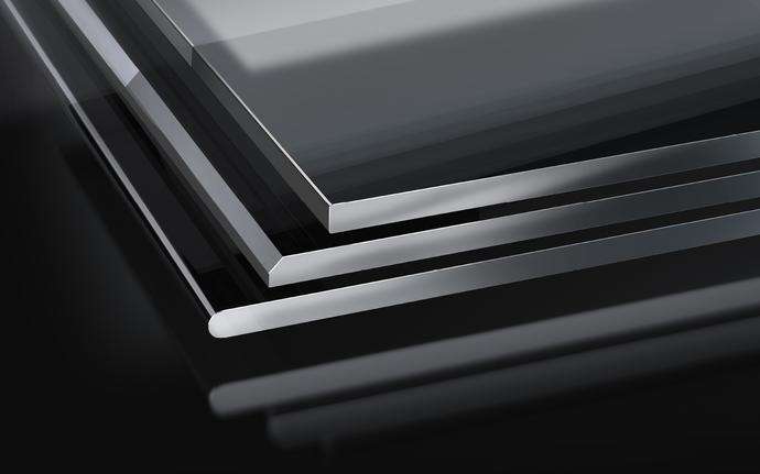 Stack of SCHOTT Cut-to-Size Substrates with different edges on a dark background