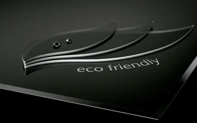 The “eco friendly” logo made of three leaves on black glass-ceramic stands for sustainable production