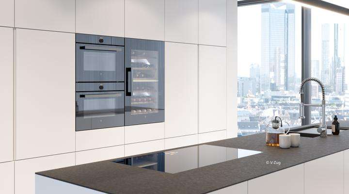 Two ovens with glass doors in a modern kitchen