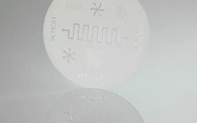 Glass disc with etched patterns