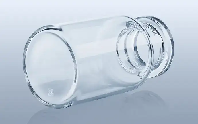 Smart Container glass vial on its side with data matrix code on the bottom