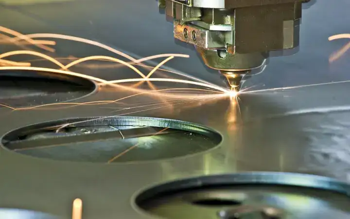 Close up of laser cutting equipment in an industrial factory