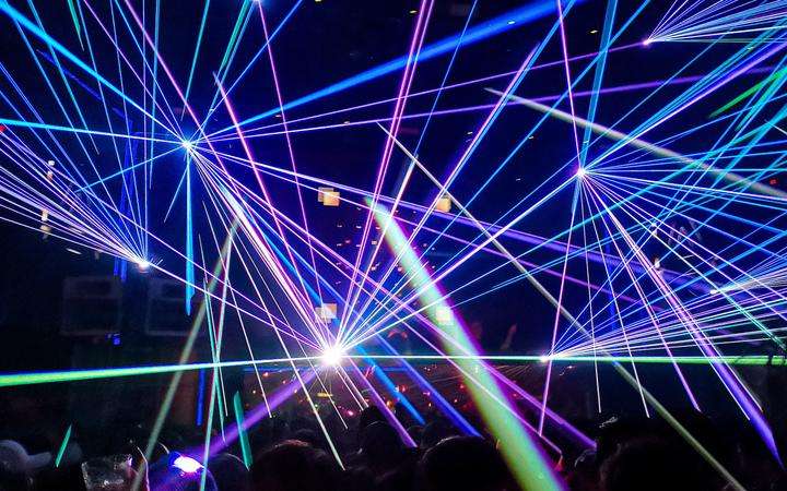 Stage lit by multicolored laser light 