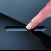 Finger touching glass fitted with a Smart Touch element