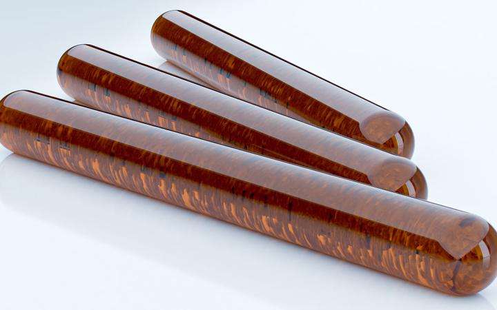 Three glass dowels made from DUROBAX® amber
