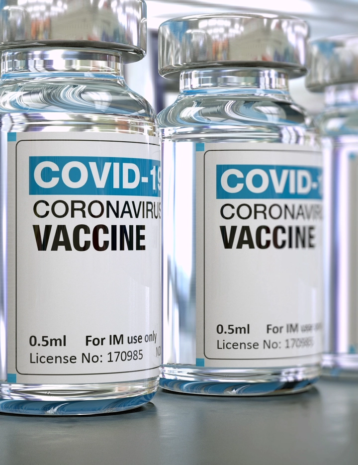 Covid-19 vaccine vials on isolated background